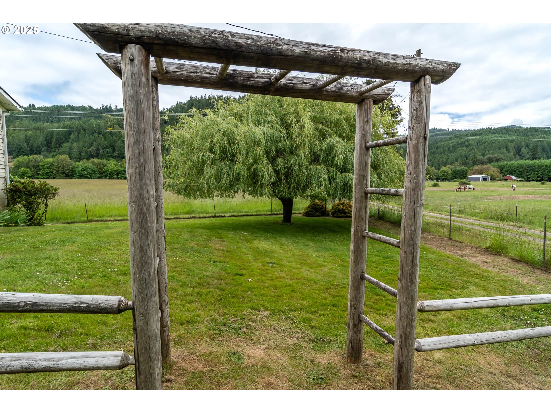 3333 Bullock Road Oakland, OR 97462 - Photo 6 of 48 a view of a deck with a yard