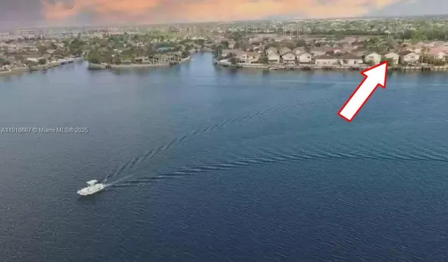 a view of a lake with houses