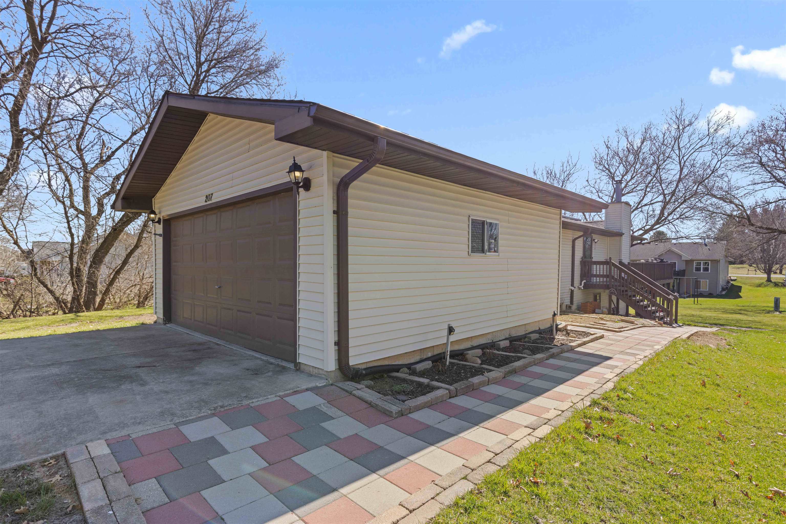 207 Redman Way Southwest Poplar Grove, IL 61065 - Photo 3 of 23 a side view of a house with a yard