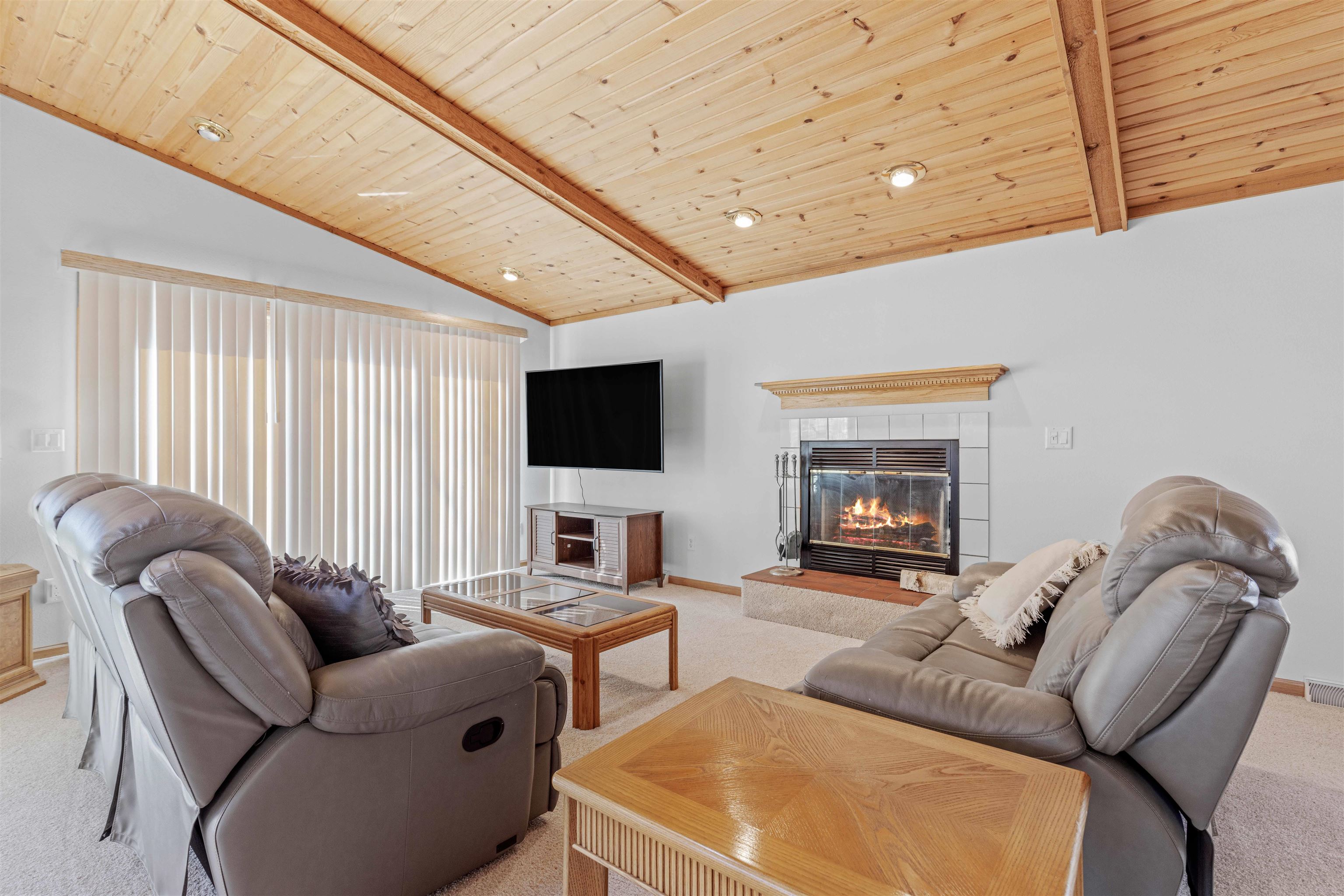 207 Redman Way Southwest Poplar Grove, IL 61065 - Photo 8 of 23 a living room with furniture and a flat screen tv