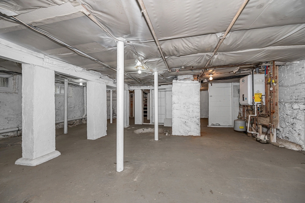 44 Mill Street Revere, MA 02151 - Photo 28 of 36 a view of empty room with air conditioner and window