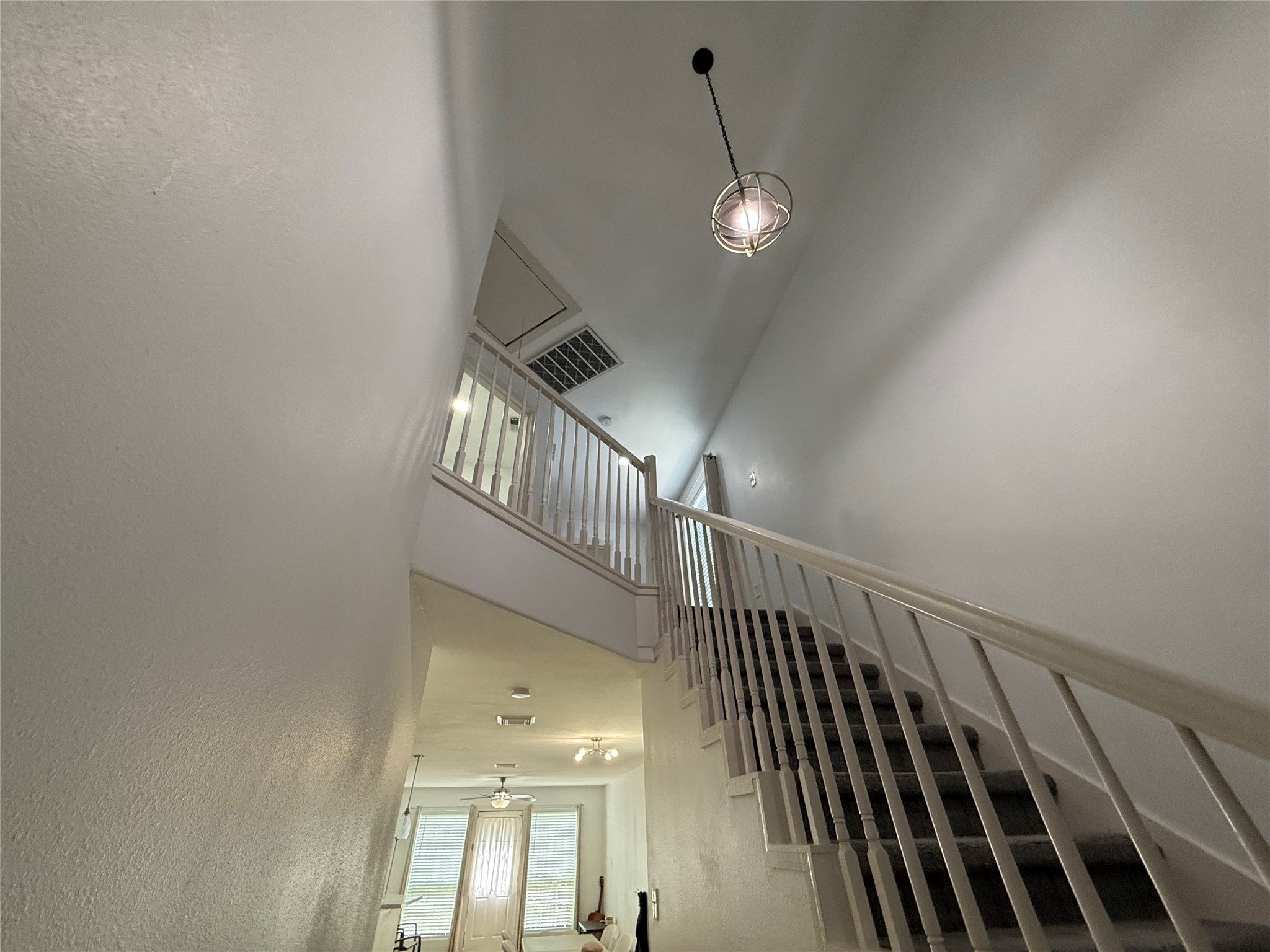3114 Bolt Street Houston, TX 77051 - Photo 13 of 32 a view of staircase with railing and white walls