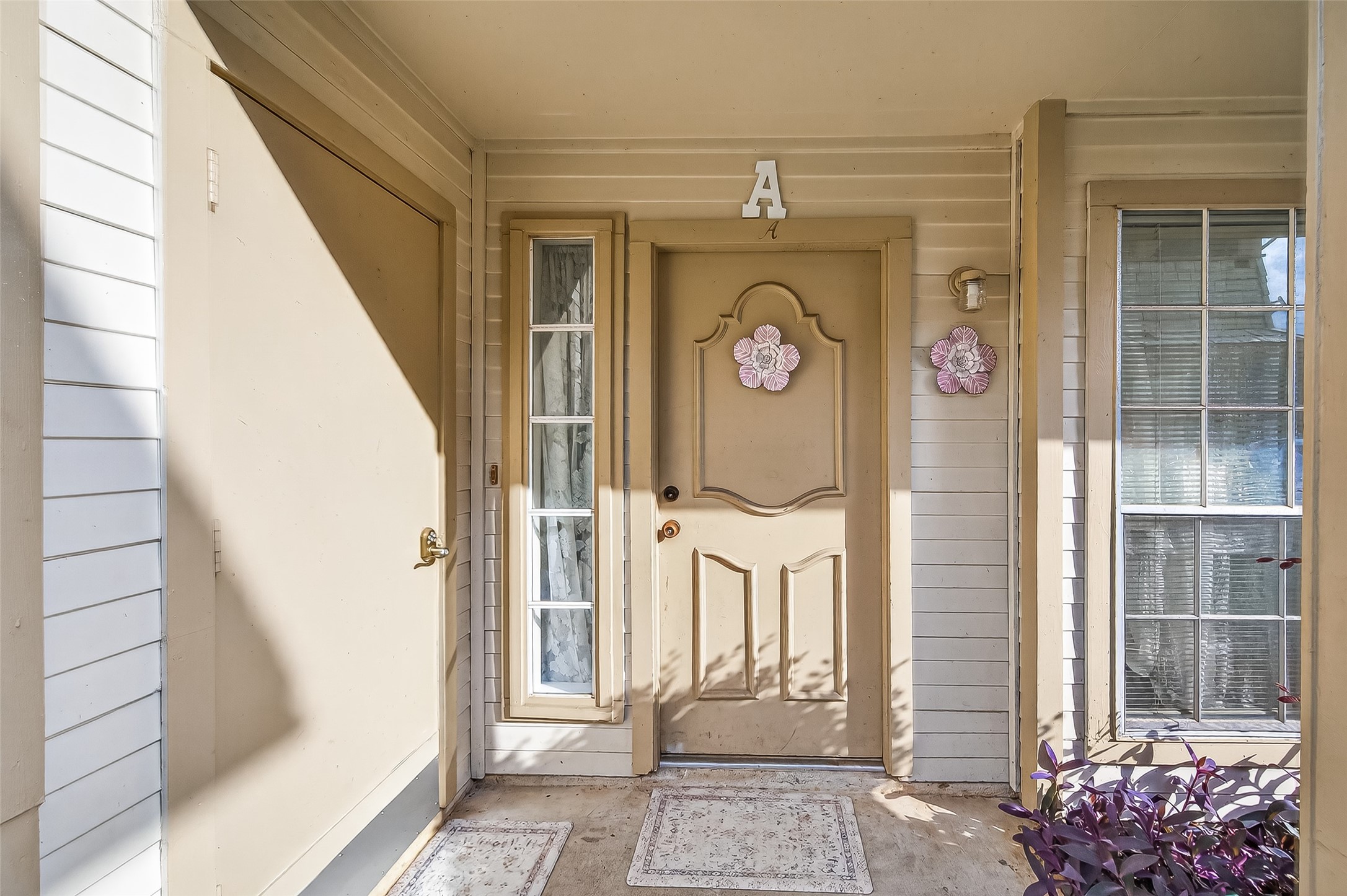 11500 Meadow Lane, Unit 4 Houston, TX 77477 - Photo 26 of 32 a view of a entryway door front of a house