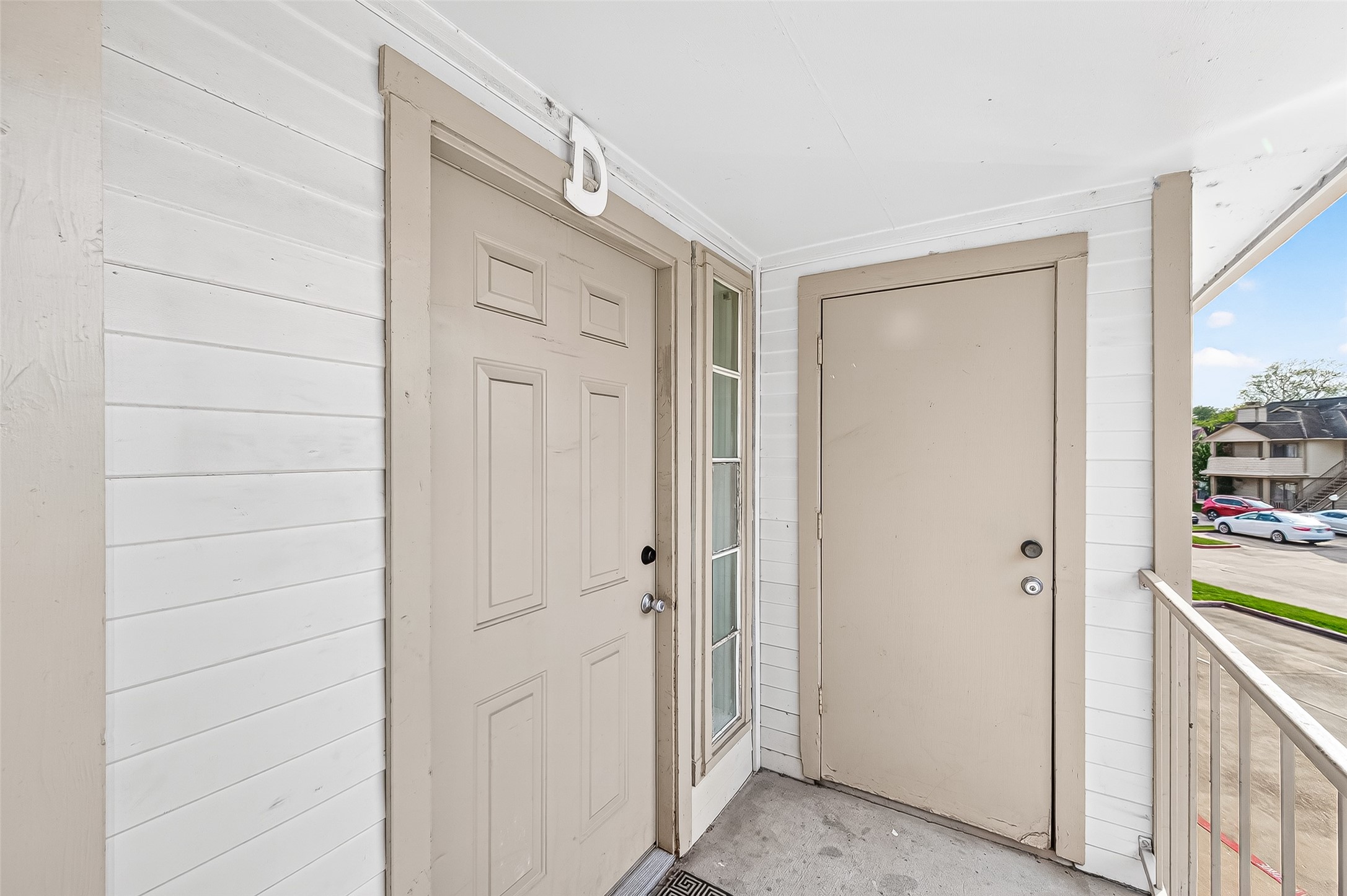 11500 Meadow Lane, Unit 4 Houston, TX 77477 - Photo 28 of 32 a view of an entryway with hallway