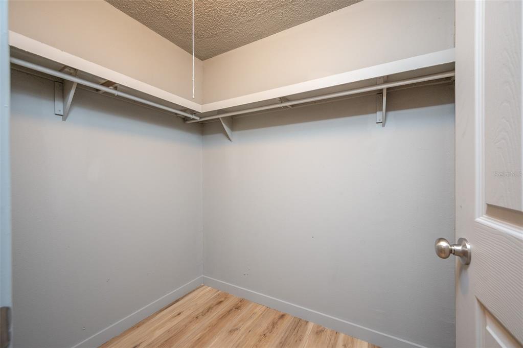 5027 Southwest 69 Street Gainesville, FL 32608 - Photo 16 of 21 a view of a room with rack on the wall