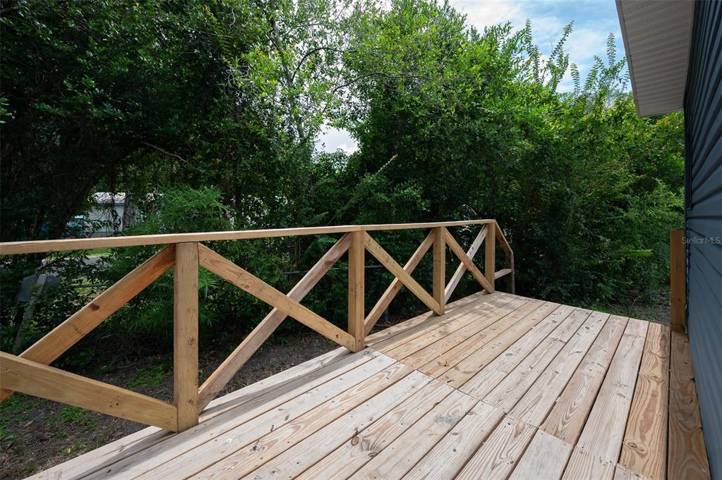 5027 Southwest 69 Street Gainesville, FL 32608 - Photo 19 of 21 a view of outdoor space with deck