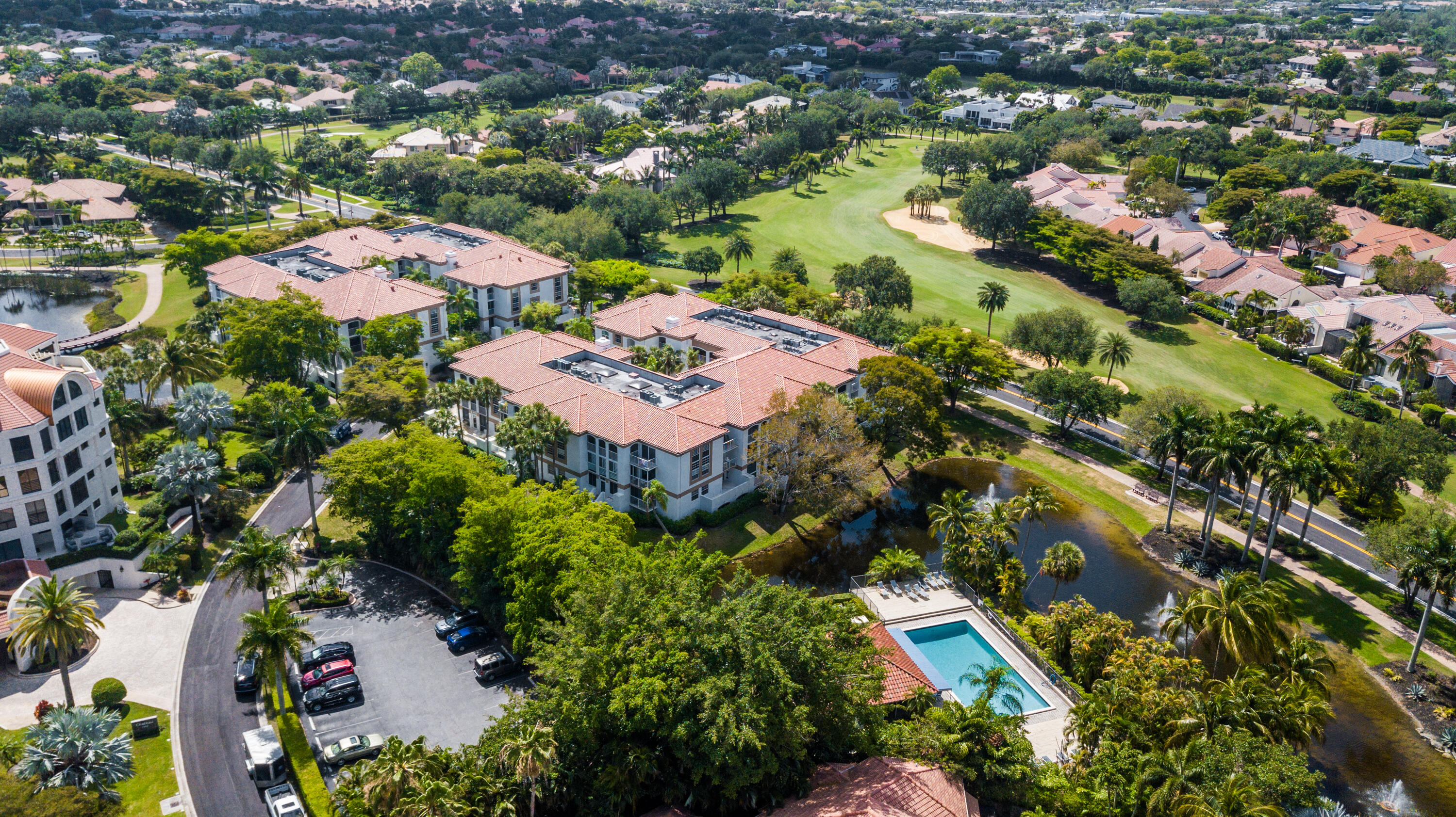 7369 Orangewood Lane, Unit 303 Boca Raton, FL 33433 - Photo 29 of 56 an aerial view of residential houses with outdoor space