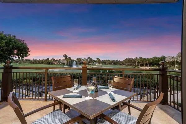 a view of a lake with a big yard
