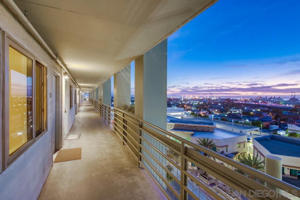 a view of a balcony with an ocean view