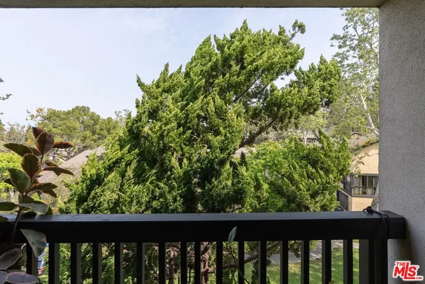 a view of a wooden fence