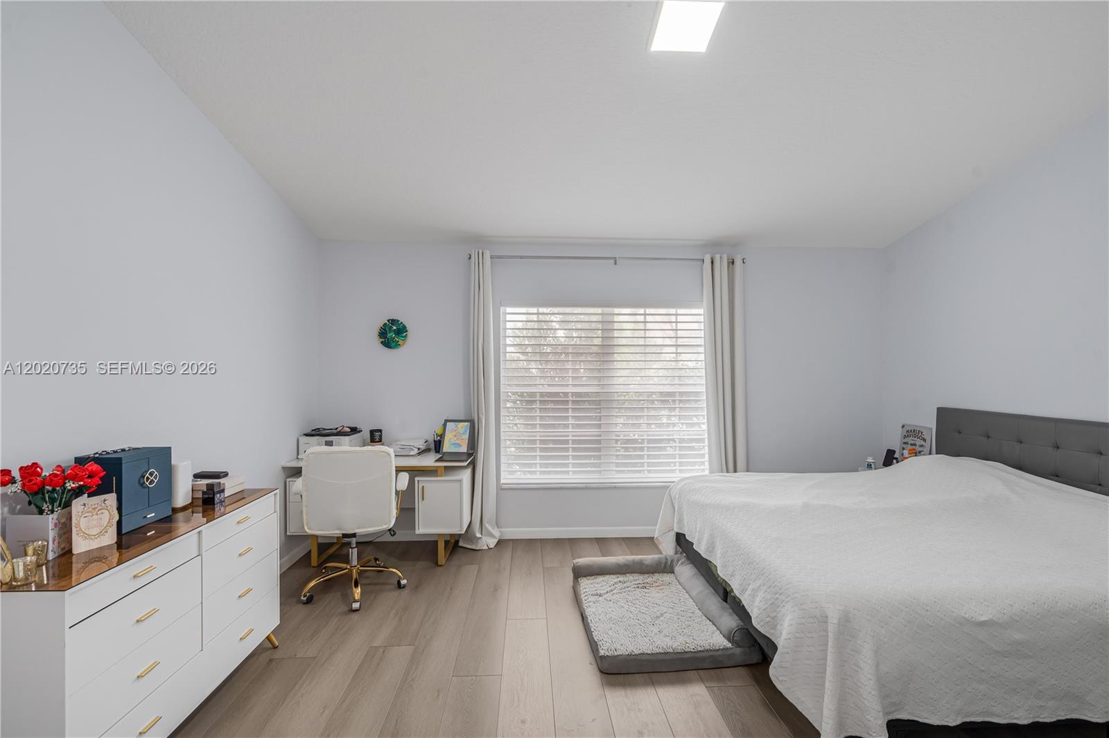 17244 Balboa Point Way Boca Raton, FL 33487 - Photo 57 of 66 a bedroom with a bed and a window