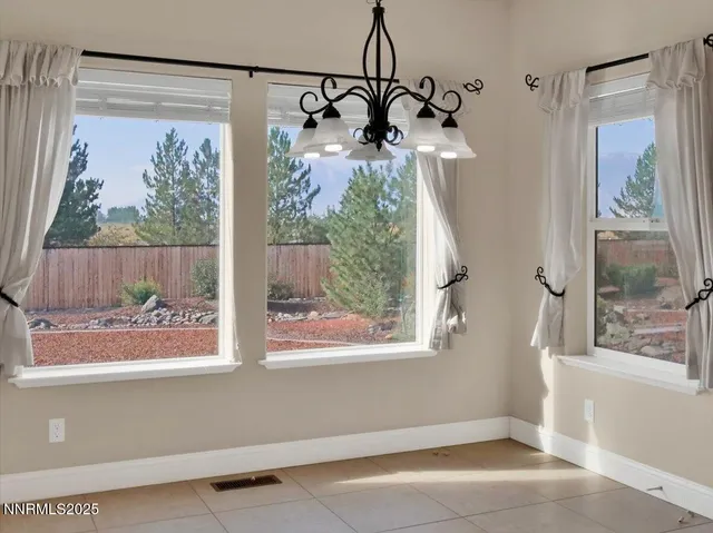 a bathroom with a sink a mirror and a light fixture