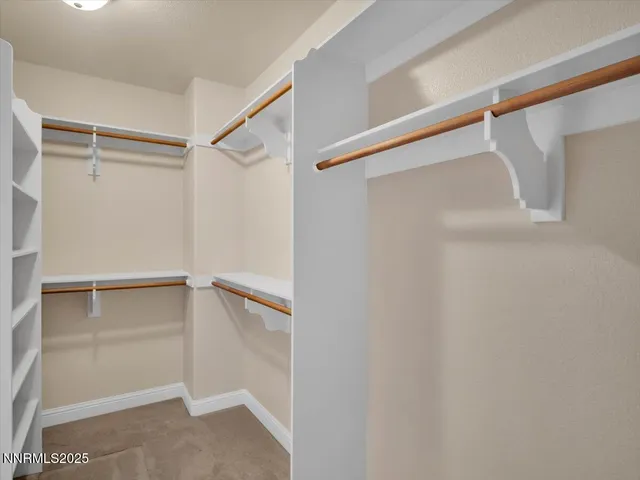 a view of a room with a large window