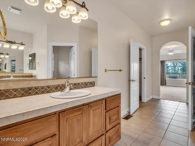 a bathroom with a toilet bathtub and shower