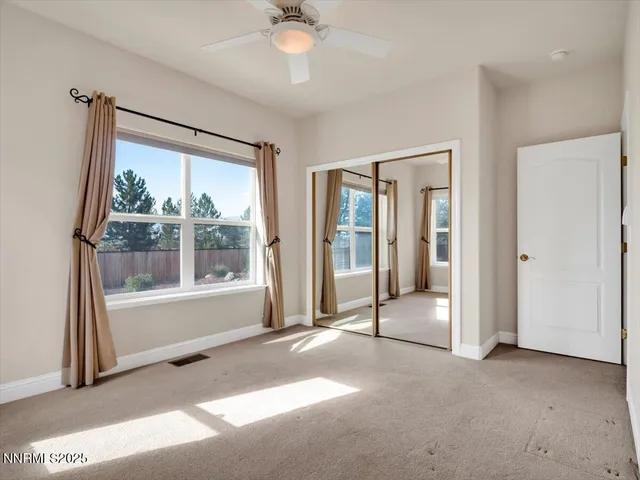 an aerial view of residential building and ocean