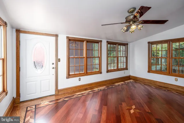 a kitchen with a stove a sink and a refrigerator