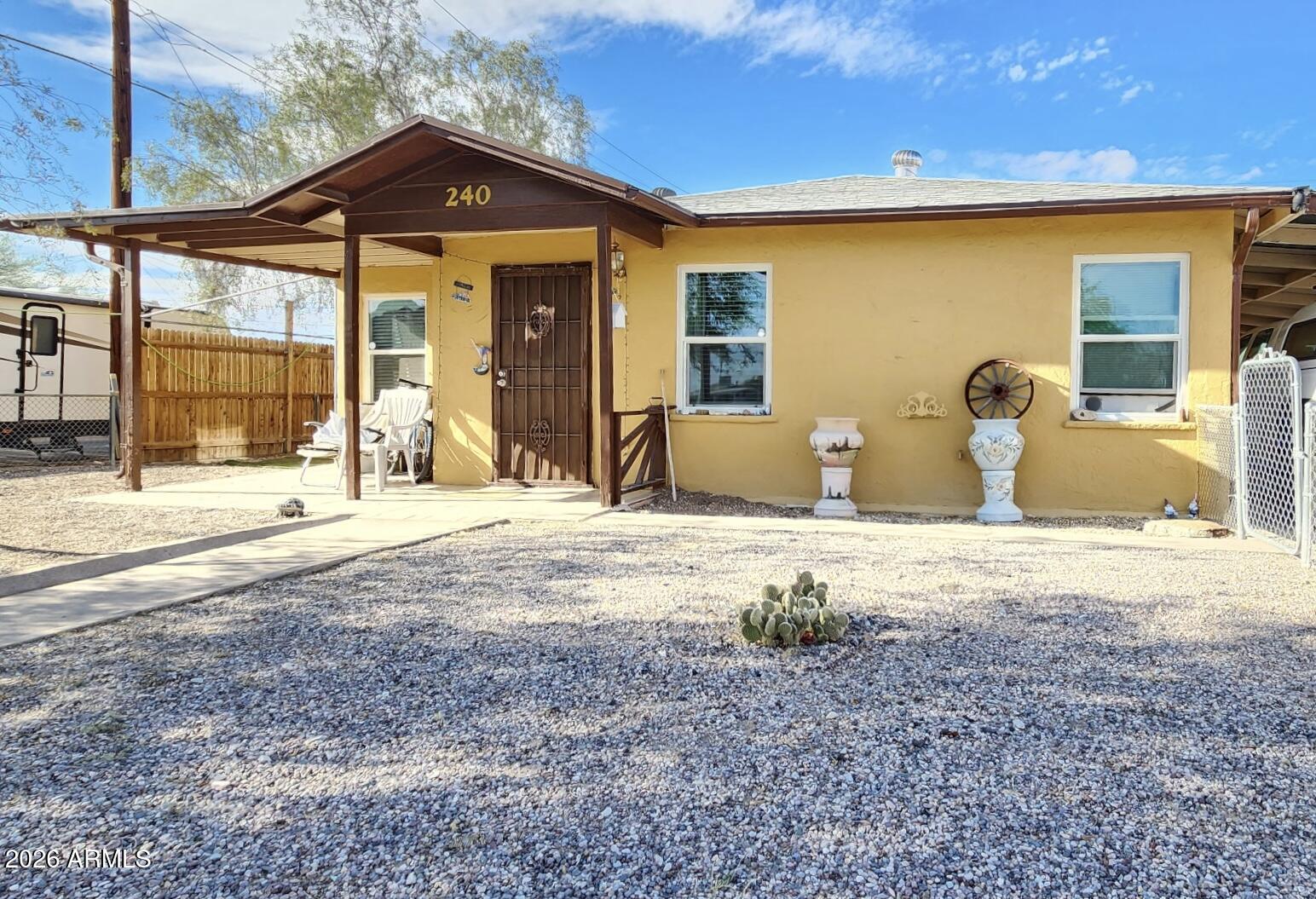 240 West 3rd Avenue Ajo, AZ 85321 - Photo 25 of 25 a front view of a house with a yard