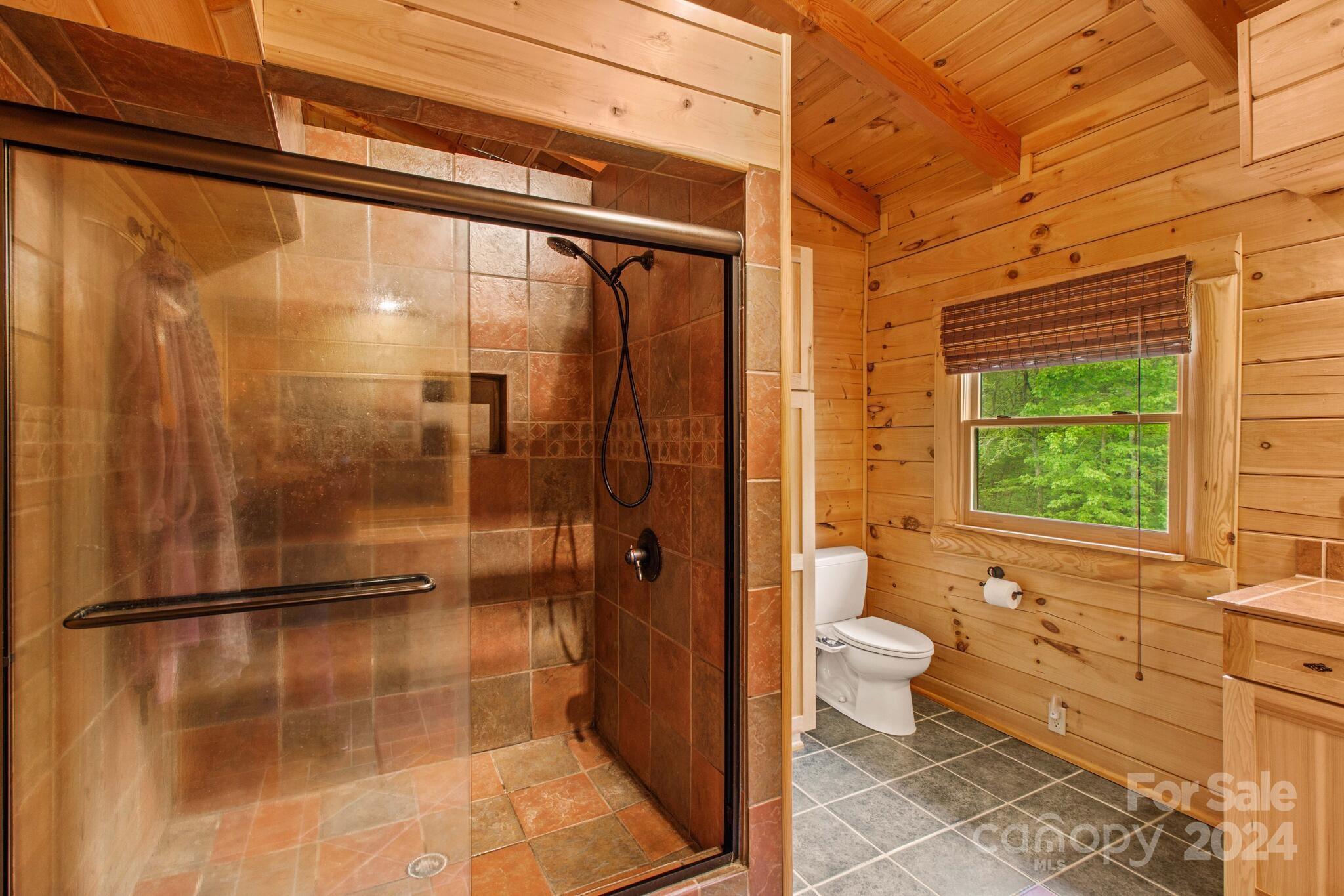1615 Barger Road Salisbury, NC 28146 - Photo 28 of 48 a bathroom with a shower and a toilet