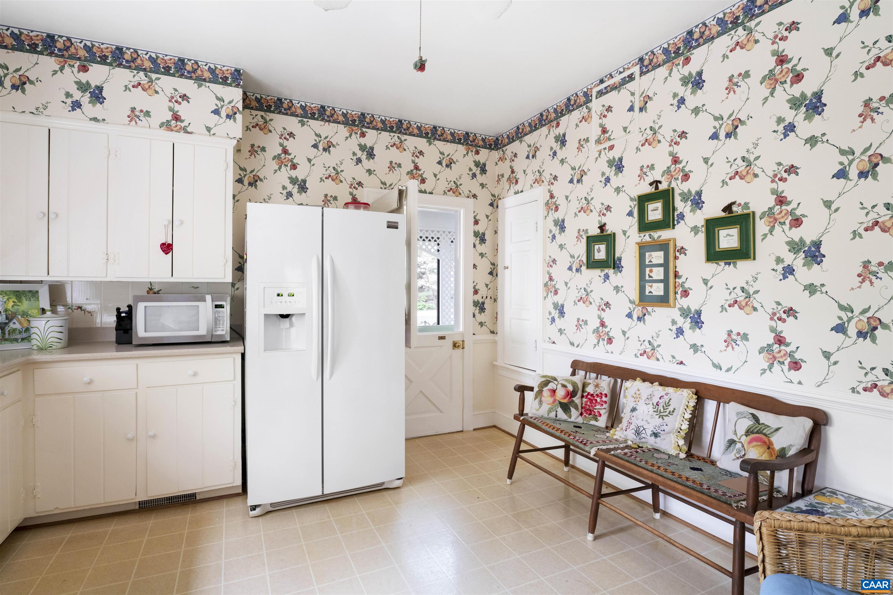 42 Old Farm Road Charlottesville, VA 22903 - Photo 12 of 35 a kitchen with cabinets and wooden floor