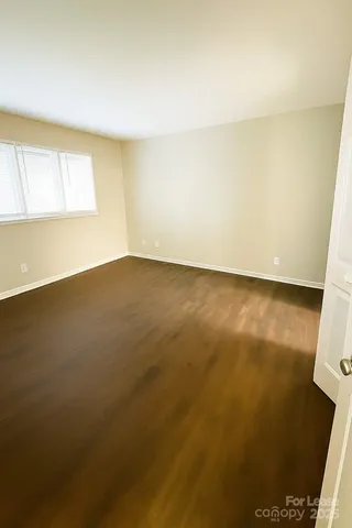 an empty room with a natural light