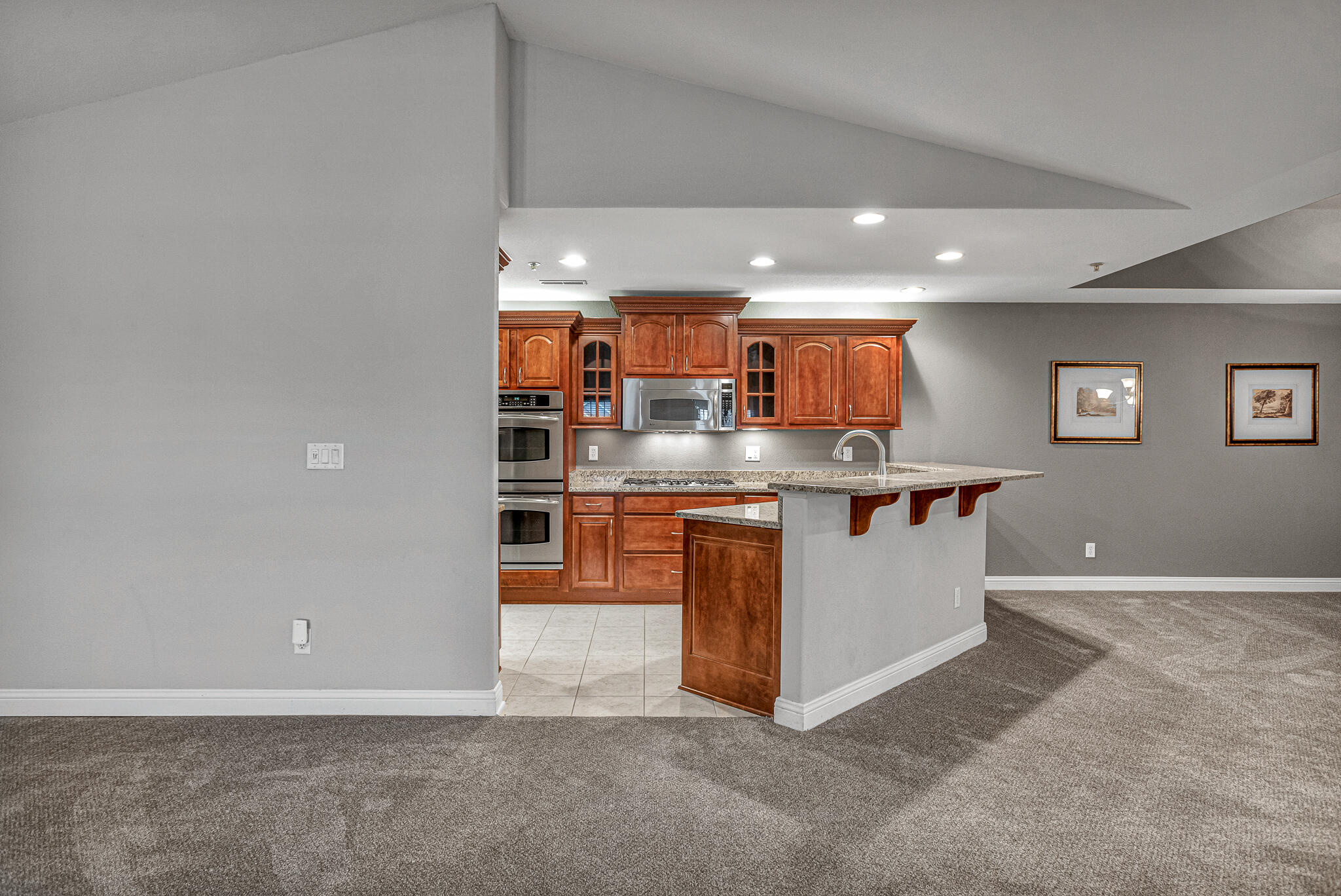 4666 Sagewood Circle, Unit 3 Pleasant Prairie, WI 53158 - Photo 30 of 41 Living Room & Kitchen