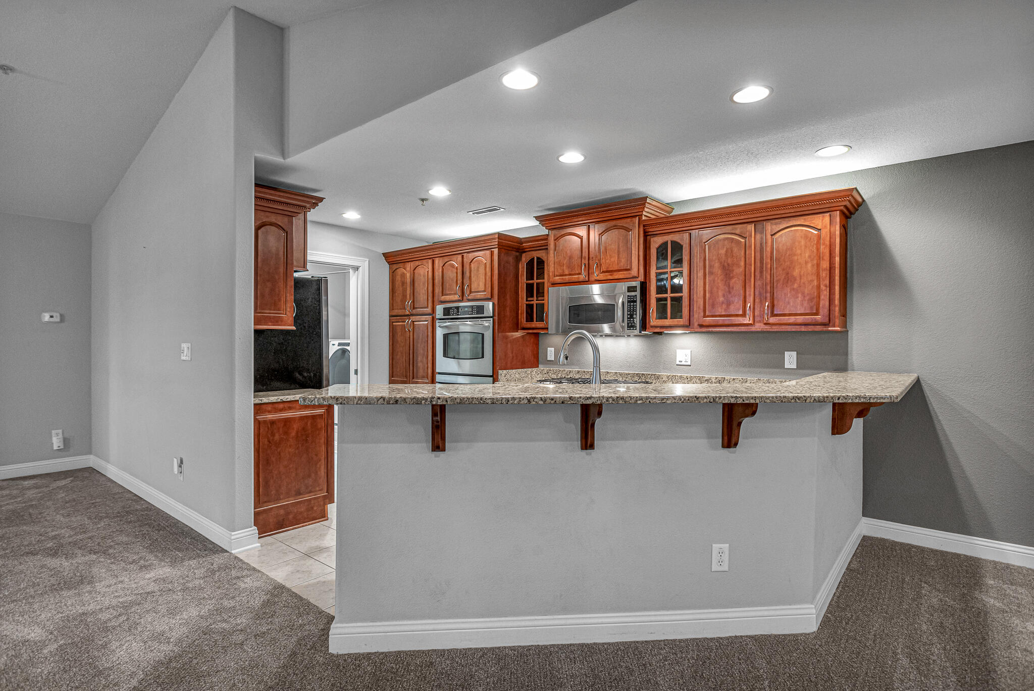 4666 Sagewood Circle, Unit 3 Pleasant Prairie, WI 53158 - Photo 31 of 41 Kitchen w/Breakfast Bar