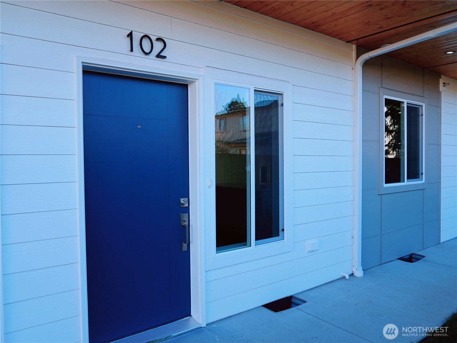 2155 Siddle Loop, Unit 102 Ferndale, WA 98248 - Photo 3 of 10 a view of front door of a house