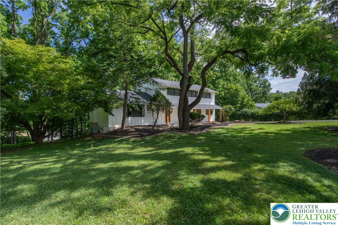 2011 Greenwood Road Allentown, PA 18103 - Photo 7 of 52 A private, tree-canopied residence with a spacious lawn and classic architectural lines.