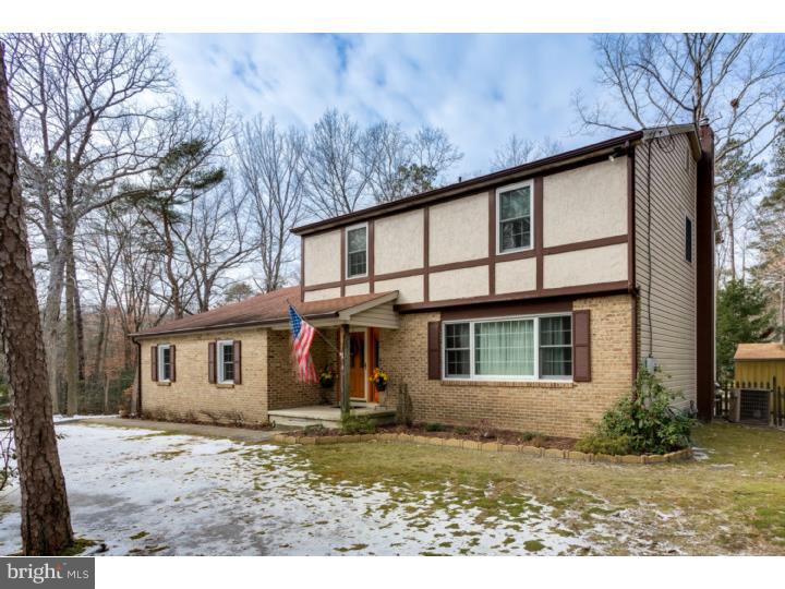 21 Fairview Road Medford, NJ 08055 - Photo 1 of 25 front view of a house with a yard
