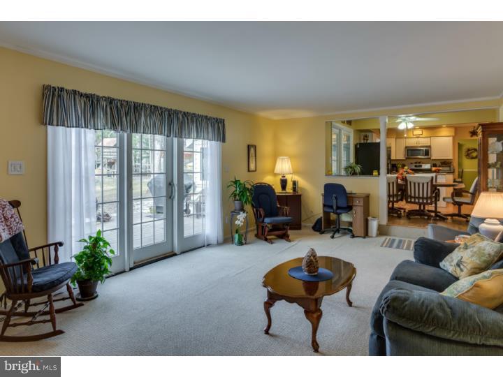 21 Fairview Road Medford, NJ 08055 - Photo 12 of 25 a living room with furniture and a large window