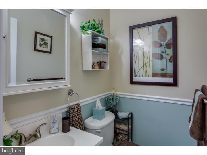 21 Fairview Road Medford, NJ 08055 - Photo 13 of 25 a bathroom with a toilet a sink and mirror