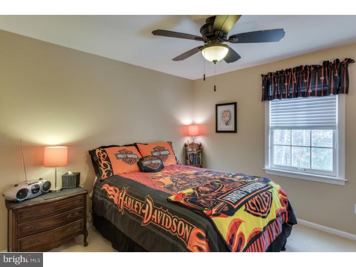 21 Fairview Road Medford, NJ 08055 - Photo 19 of 25 a bedroom with a bed and a dresser