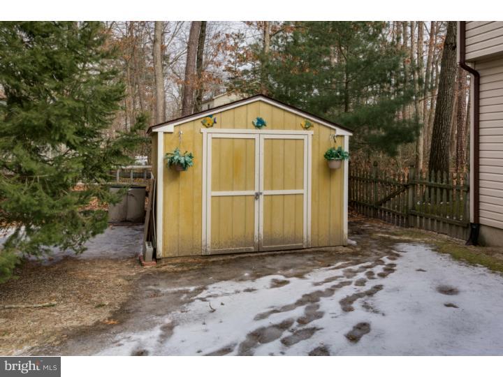 21 Fairview Road Medford, NJ 08055 - Photo 24 of 25 a front view of a house with a yard