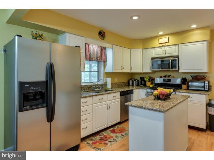 21 Fairview Road Medford, NJ 08055 - Photo 6 of 25 a kitchen with stainless steel appliances granite countertop a refrigerator a stove a sink dishwasher and a refrigerator