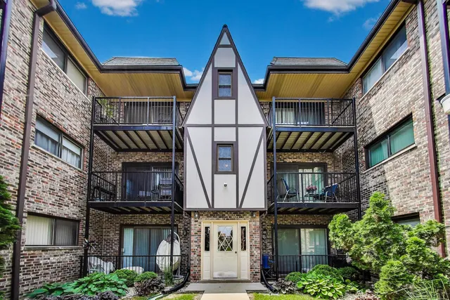 a view of multiple houses with stairs
