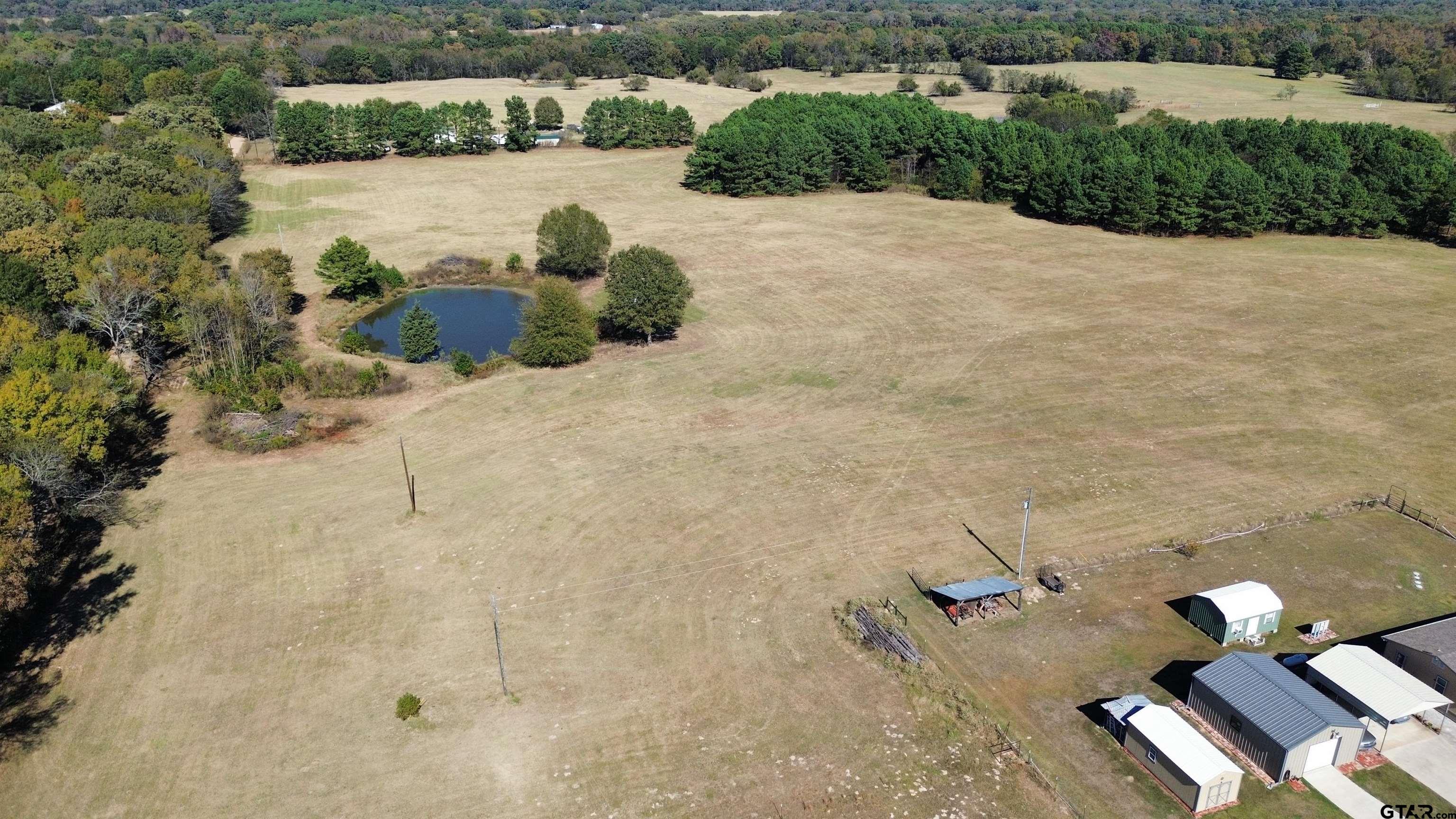 3265 County Road 3265 Mount Pleasant, TX 75455 - Photo 4 of 4 a view of a lake with outdoor space