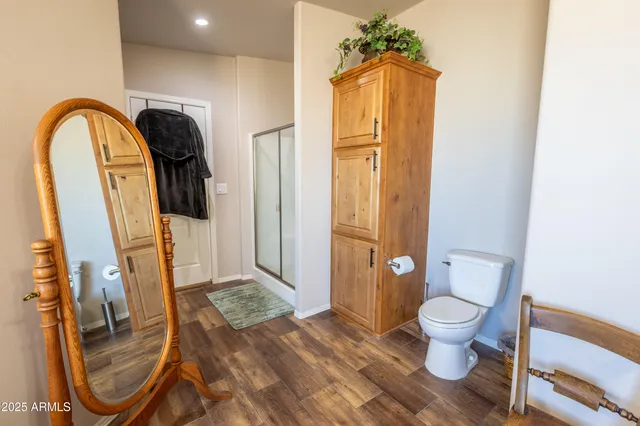 a dining room with furniture and a window