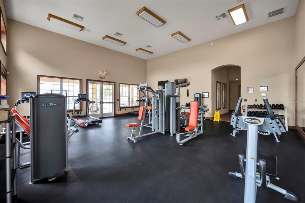 4946 Northeast 124th Road Oxford, FL 34484 - Photo 50 of 69 a view of a room with gym equipment