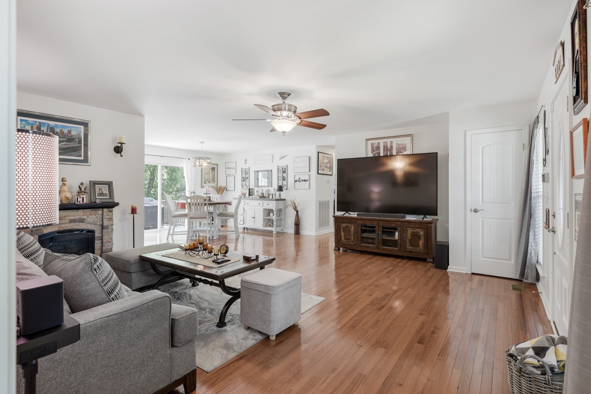 1555 Heller Ridge Spring Hill, TN 37174 - Photo 12 of 50 a living room with furniture and a flat screen tv