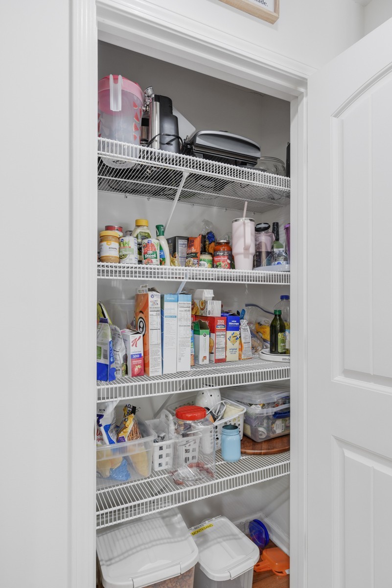1555 Heller Ridge Spring Hill, TN 37174 - Photo 18 of 50 a cabinet with granite countertop lots of different kinds of food
