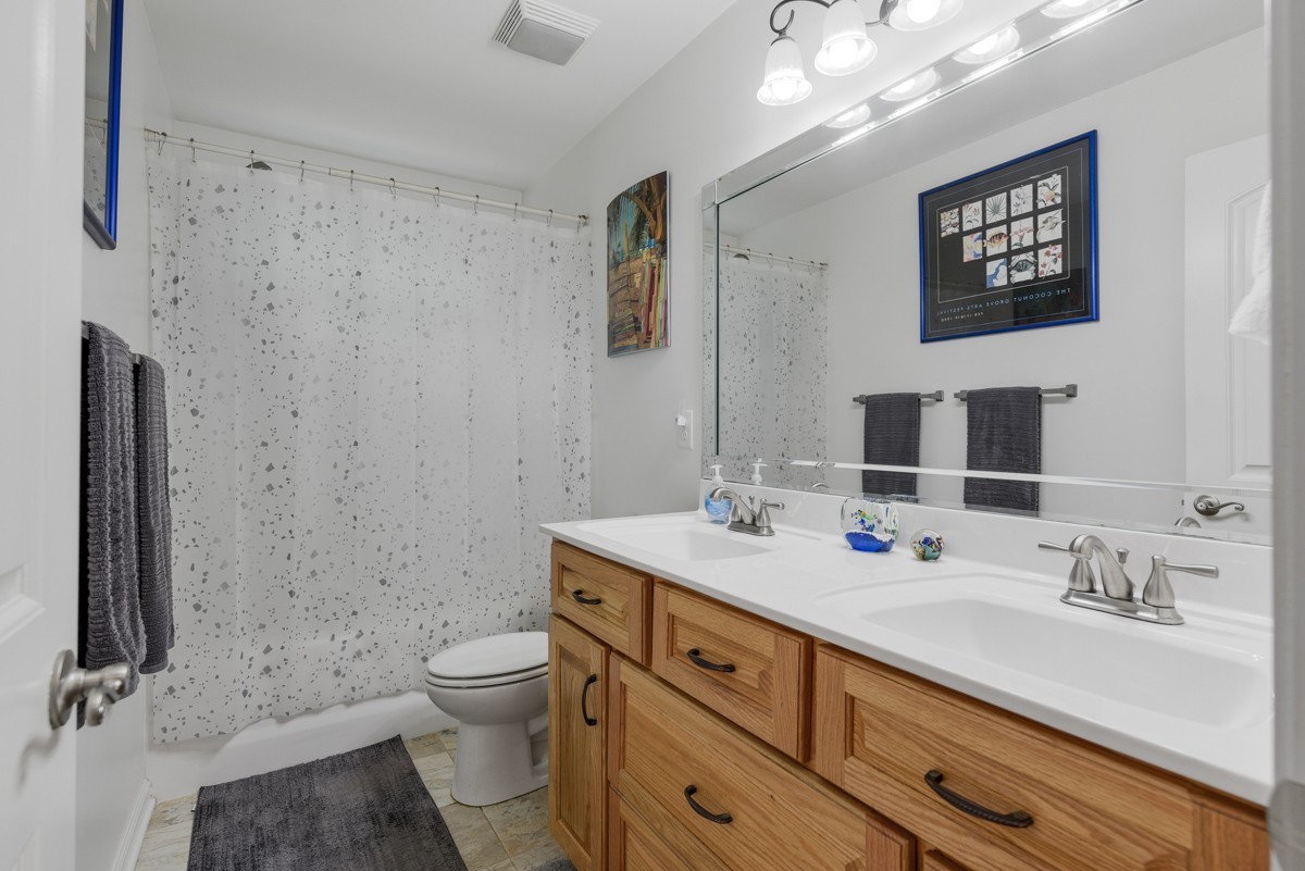 1555 Heller Ridge Spring Hill, TN 37174 - Photo 29 of 50 a bathroom with a sink toilet and shower