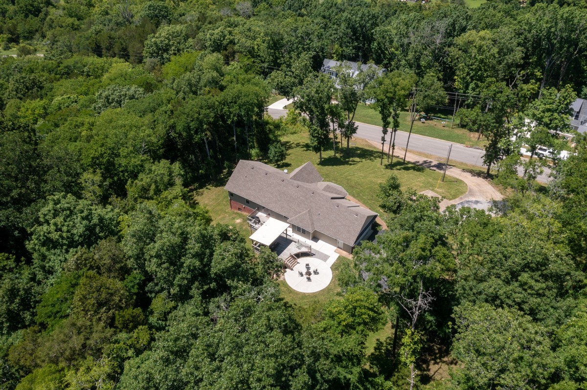 1555 Heller Ridge Spring Hill, TN 37174 - Photo 39 of 50 an aerial view of a house with yard outdoor seating and yard