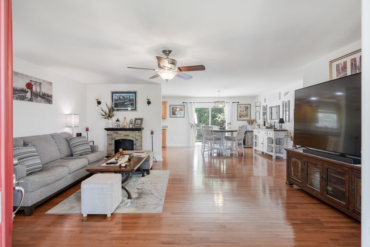 1555 Heller Ridge Spring Hill, TN 37174 - Photo 8 of 50 a living room with furniture and a flat screen tv