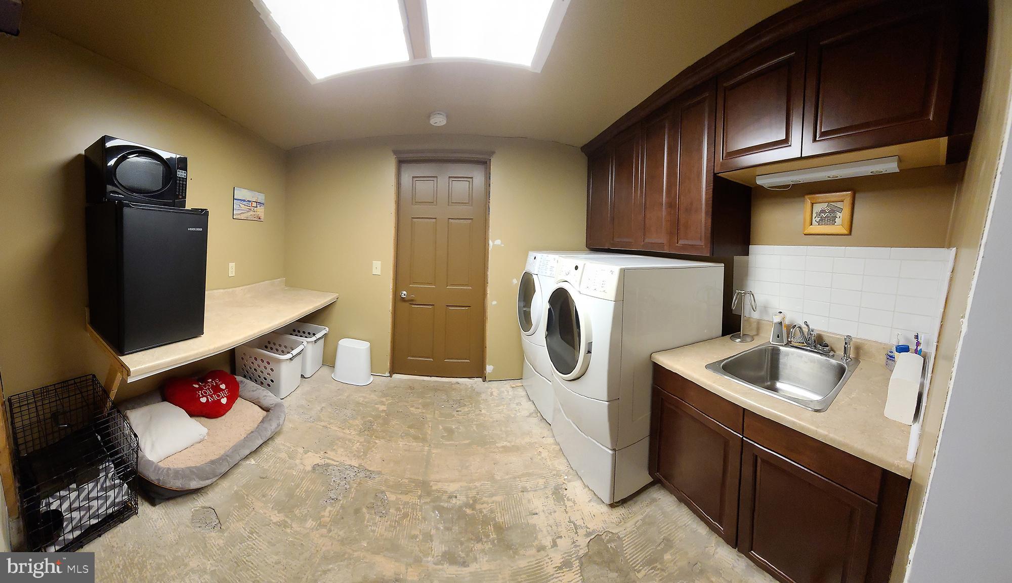 681 Turkey Bird Road Newport, PA 17074 - Photo 12 of 19 Laundry Room with cabinets and sink
