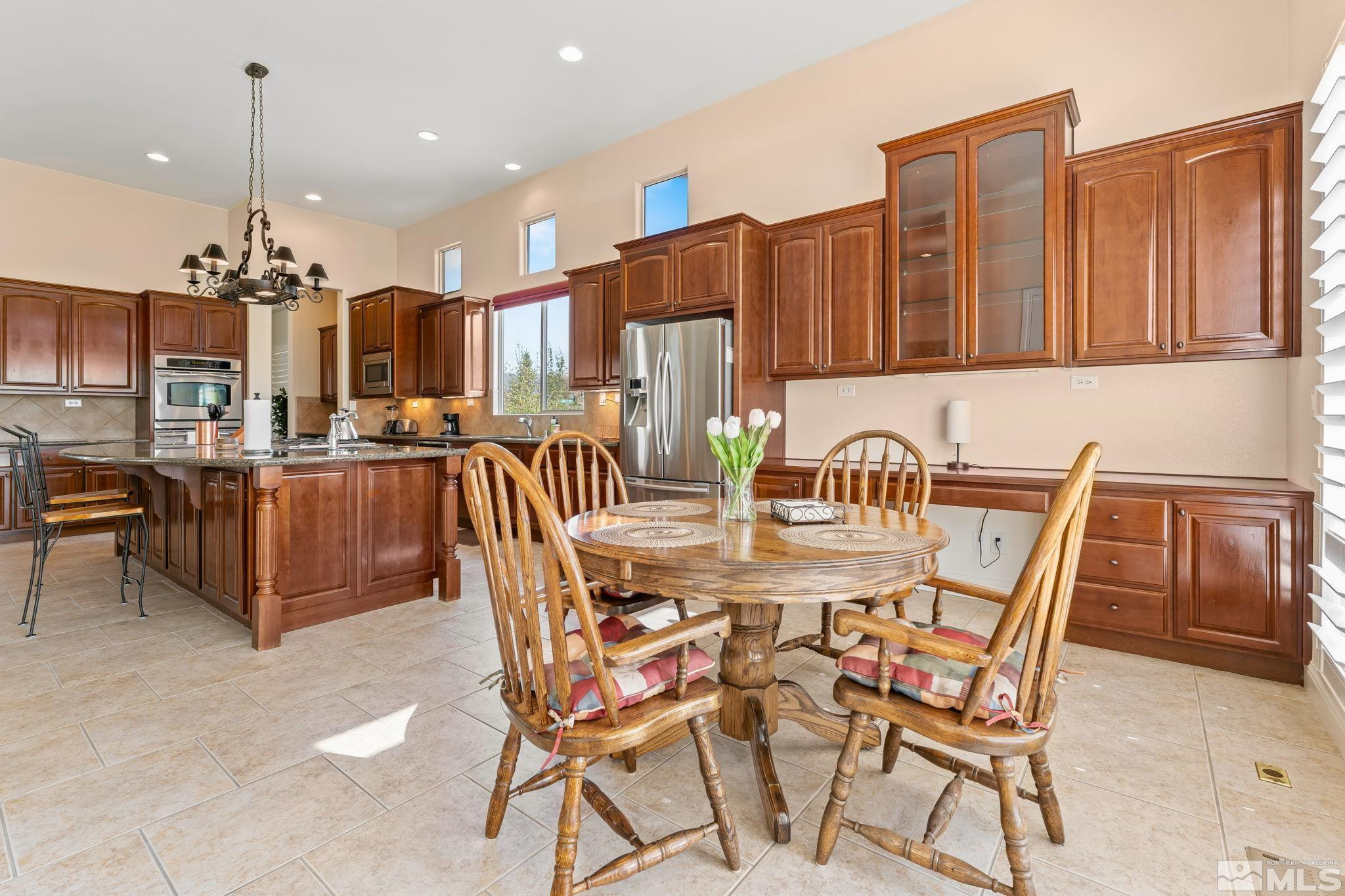 13395 Damonte View Lane Reno, NV 89511 - Photo 17 of 40 a view of a dining room with furniture