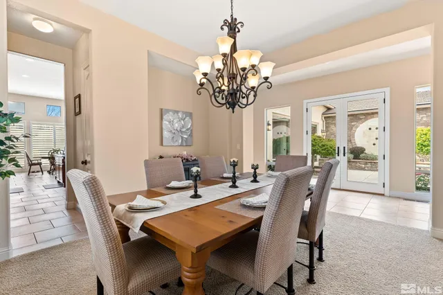 a bedroom with a bed dresser and a window