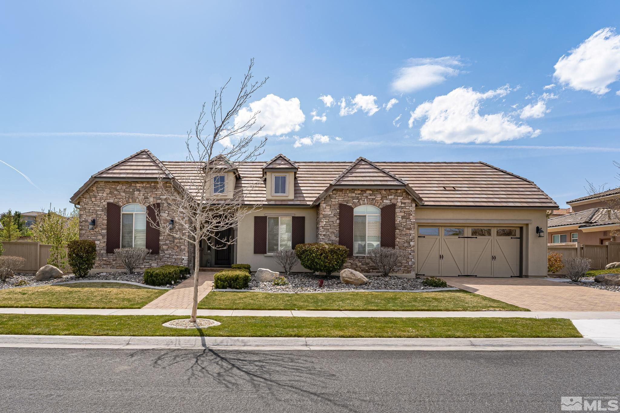 13395 Damonte View Lane Reno, NV 89511 - Photo 2 of 40 a front view of house with yard and green space