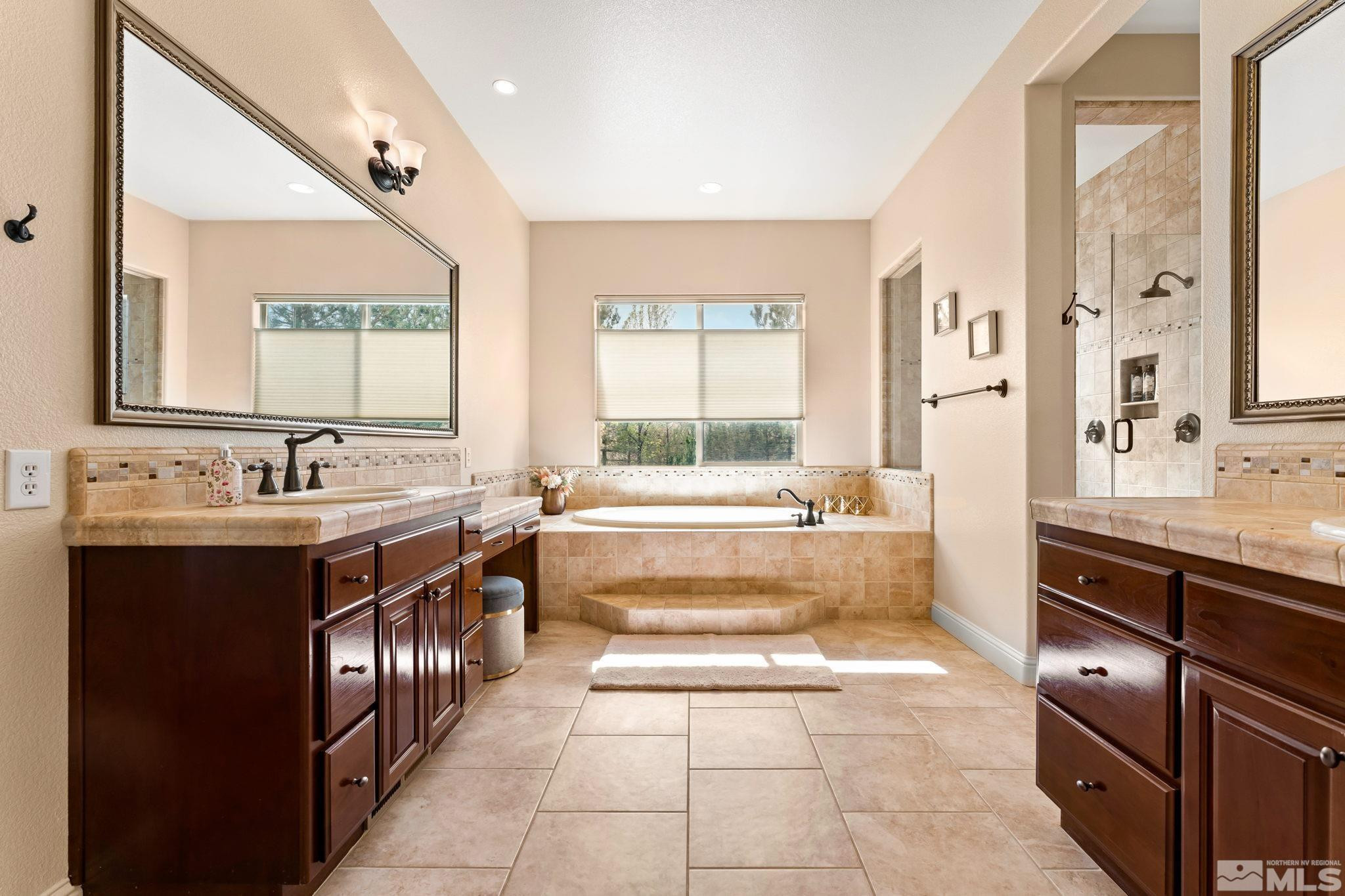 13395 Damonte View Lane Reno, NV 89511 - Photo 24 of 40 a spacious bathroom with a tub sink and mirror
