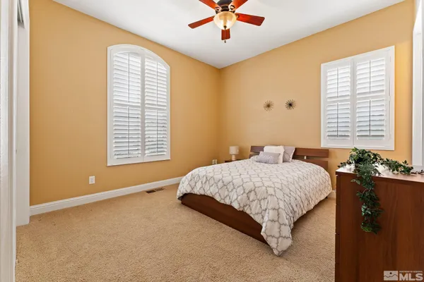 a view of a bedroom with cabinet