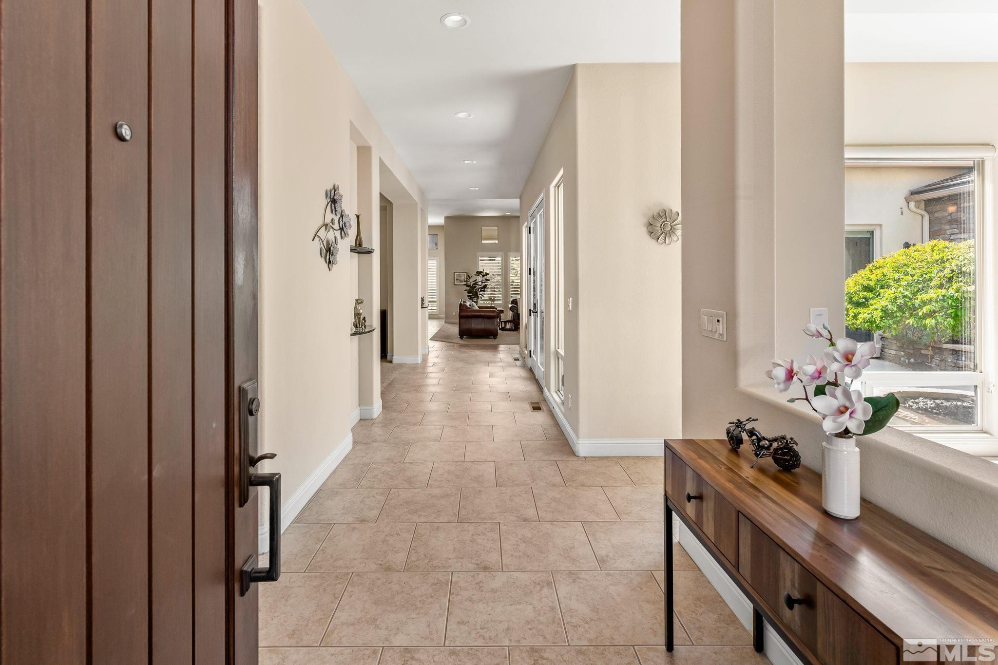 13395 Damonte View Lane Reno, NV 89511 - Photo 3 of 40 a view of a hallway and dining room
